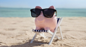 Piggy bank keeps money cool on the beach with some sunnies